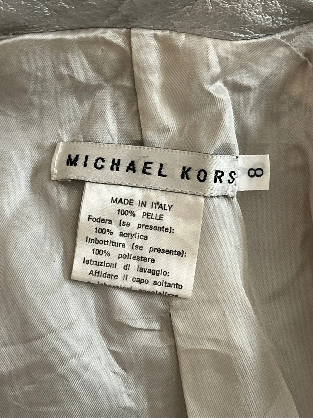 Michael Kors Silver Metallic Leather trench coat.  Size 8